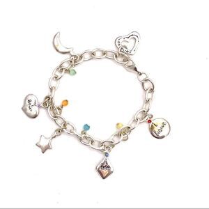 Silver color charm bracelet with words and beads